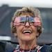 Marlys Hamill wearing American flag glasses watches Ypsilanti's 4th of July parade.
Courtney Sacco I AnnArbor.com   