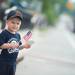 2-year-old Logan Lozano watches as Ypsilanti's 4th of July Parade travels down Cross street.
Courtney Sacco I AnnArbor.com 