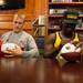 Former Michigan football players Jordan Kovacs and Denard Robinson sign autographs at the M Den on Wednesday, July, 10. 
Courtney Sacco I AnnArbor.com    