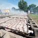 Chickens line the grills at Alumni Memorial Field in Manchester.  
Courtney Sacco I AnnArbor.com 