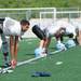 Skyline High School varsity football team stretch at the start of practice, Thursday, August, 15.
Courtney Sacco I AnnArbor.com 