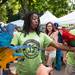 Andresha Stewart of Ypsilanti holds two parrots at the Ypsilanti Heritage Festival at Riverside park, Friday, August, 16. 
Courtney Sacco I AnnArbor.com 