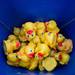 Rubber duckies sit in a bucket as they wait to be placed in with others above the Huron river, Sunday, August 18. 
Courtney Sacco I AnnArbor.com  