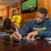 Former Wolverines basketball player Trey Burke signs an autograph at the MDen in Ann Arbor, Saturday, August, 24.
Courtney Sacco I AnnArbor.com   