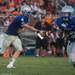 The Railsplitters quarterback Eugene Smith hands off the ball during the second quarter of their game against Belleville at Lincoln High School, Friday, Aug, 30.
Courtney Sacco I AnnArbor.com    