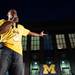 Former Michigan Wolverine Desmond Howard addresses the crowd during a pep rally held at the Diag Friday, Sept. 6, the night before the Michigan Wolverines take on Notre Dame at Michigan Stadium. 
Courtney Sacco I AnnArbor.com  
