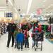Pittsfield firefighters Craig Liggett and Dan Olson walk through Meijer with the Zirker boys during this years shop with a hero event.
Courtney Sacco I AnnArbor.com 
