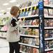 Nine year old Emma picks out a DVD during this years shop with a hero event at Meijer.
Courtney Sacco I AnnArbor.com 