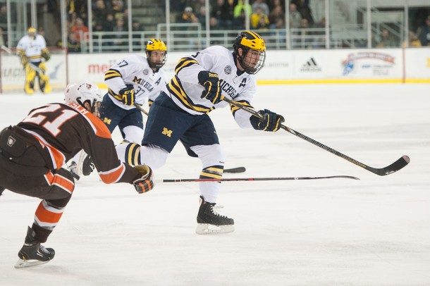 The Wolverines defensemen Lee Moffie passes the puck against The Bowling Green Falcons, Tuesday Jan. 8.
Courtney Sacco I AnnArbor.com