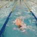 Saline's David Boland in the lead during the men's 100 yard backstroke Thursday Jan. 10.
Courtney Sacco I AnnArbor.com   