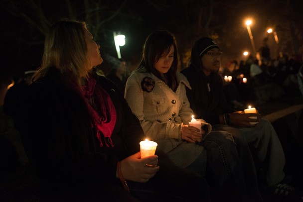 Friends, classmates and family members of Julia Niswender held a candle light vigil in memory of her outside of Big Bob's Lake house at Eastern Michigan University Friday night.
Courtney Sacco I AnnArbor.com