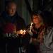 Julia Niswender's parents Jim and Kim Turnquist along with her twin sister Jennifer and younger sister Madison Turnquist all light candles during a vigil held at EMU's Big Bob's Lake house Friday evening.
Courtney Sacco I AnnArbor.com 