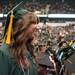 An undergraduate smiles as she waits in line to receive her diploma during EMU's 2012 winter commencement.
Courtney Sacco I AnnArbor.com  
