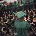 A 2012 winter class graduate conducts the EMU Symphonic band after commencement.
Courtney Sacco I AnnArbor.com  
