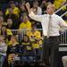 Wolverines head coach John Beilein singles to one of his players after EMU scored a basket during the fist half the thursday nights game. 
Courtney Sacco I AnnArbor.com  
