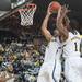 Wolverines freshman Mitch McGary tries to make a basket against EMU during Thursday nights game.
Courtney Sacco I AnnArbor.com 
 
