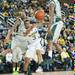 Wolverines sophomore Trey Burke passes the ball during Thursday nights game against Easter Michigan.
Courtney Sacco I AnnArbor.com 