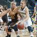 Wolverines Madison Ristovski aggressively plays against Valparaiso's Jessica Carr During Thursday nights game.
Courtney Sacco I AnnArbor.com  