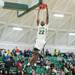 Huron's Xavier Cochran makes a slam-dunk  during Friday nights game against Chelsea.
Courtney Sacco I AnnArbor.com 