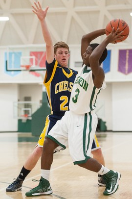 Huron's Yontae Jackson passes the ball against Chelsea's Cam Starkey during Friday nights.
Courtney Sacco I AnnArbor.com