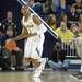 Michigan's freshman Glenn Robinson III dribbles the ball down court during their game against Central Michigan on Saturday Dec. 29. Courtney Sacco I AnnArbor.com  
