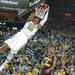 The Wolverines freshman Spike Albrecht dunks the ball against Central Michigan during their game Saturday Dec. 29. 
Courtney Sacco I AnnArbor.com 