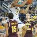 The Wolverines sophomore Trey Burke jumps to make a basket against Central Michigan during their game Saturday Dec. 29. 
Courtney Sacco I AnnArbor.com 