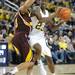 The Wolverines freshman Caris LeVert drives the ball against Central Michigan during their game Saturday Dec. 29. 
Courtney Sacco I AnnArbor.com   