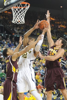 Michigan Junior Jordan Morgan jumps to make a basket against Central Michigan during the first half of the game on Saturday Dec. 29.
Courtney Sacco I AnnArbor.com