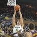 The Wolverines freshman Mitch McGary jumps to try to make a basket against Central Michigan during their game Saturday Dec. 29. 
Courtney Sacco I AnnArbor.com 