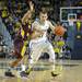The Wolverines freshman Nik Stauskas drives the ball against central Michigan during their game Saturday Dec. 29. 
Courtney Sacco I AnnArbor.com  