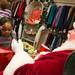 Santa hands 4-year-old Kalei Jackson a Christmas present Saturday afternoon.
Courtney Sacco I AnnArbor.com 
