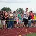 Saline High School student  John Dosen sets the pace for a group of runners on their first lap of the Saline High School track as they try to beat the recored for the fastest mile run in Michigan, Sunday, August, 4.
Courtney Sacco I AnnArbor.com 