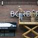 Laborers work to remove the Borders sign from the wall on Monday, Dec. 31. Daniel Brenner I AnnArbor.com