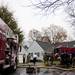 Firefighers resound to the scene on Heritage Drive in Ann Arbor on Tuesday. Fire Chief Chuck Hubbard says they extinguished the fire in 30 minutes, but the interior of the structure is completely burnt. He was unable to determine the cause of that fire at the time. Daniel Brenner I AnnArbor.com