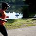 A running participant jogs by wildlife at Gallup Park on Sunday, July 14. Daniel Brenner I AnnArbor.com
