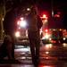 Pedestrians watch the scene of a fire at 1310 Packard Street on Sunday, Jan. 13. Daniel Brenner I AnnArbor.com