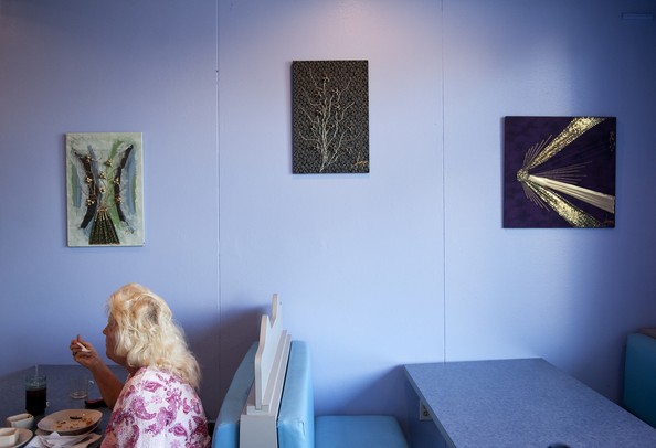 Ypsilanti resident Linda Underwood eats a meal at Samosa House on Tuesday. Underwood says she was going to get a pizza when she discovered this restaurant and decided to try it. Daniel Brenner I AnnArbor.com