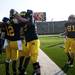 The Michigan football team celebrates after quarterback Devin Gardner's  rushing touchdown in overtime on Saturday. Daniel Brenner I AnnArbor.com