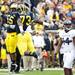 Michigan defensive tackles Jibreel Black and William Campbell celebrate after a big play in the second half of the game against Northwestern on Saturday. Daniel Brenner I AnnArbor.com