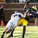 Michigan quarterback Devin Gardner gets rid of the ball before being tackled in the game against Northwestern on Saturday. Daniel Brenner I AnnArbor.com