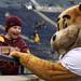 Will Harder,6, has a laugh with Minnesota's mascot, Goldy, as Michigan took on the University of Minnesota Saturday October 1, 2011. Jeff Sainlar I AnnArbor.com 
