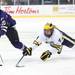 Niagara's Scott Arnold's shot is altered by the diving attempt of Kevin Clare as Michigan took on Niagara University in their season opener at Yost Ice Arena Tuesday October, 4, 2011. Michigan won the match 5-0. Jeff Sainlar I AnnArbor.com