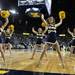 Cheerleaders excite the crowd as Michigan took on Ferris State at the Crisler Arena Friday November 11, 2011. (AP Photo/AnnArbor.com, Jeff Sainlar I AnnArbor.com)