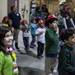 Alexandra Larson, left, and the rest of the children watch as a firefighter comes down the fireman's poll as the Ann Arbor Fire Department hosted its annual Bikes for Tykes event Tuesday December 13, 2011. The AAFD and Two Wheel Tango, a local bike shop, team up to provide bikes and helmets for children ages 4 to 10 who need assistance during the holiday season. Jeff Sainlar I AnnArbor.com