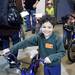 Christopher Pike,7 , plays with his new bike as the Ann Arbor Fire Department hosted its annual Bikes for Tykes event Tuesday December 13, 2011. The AAFD and Two Wheel Tango, a local bike shop, team up to provide bikes and helmets for children ages 4 to 10 who need assistance during the holiday season. Jeff Sainlar I AnnArbor.com