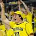 Michigan student Bob MacDermaid cheers celebrates after Michigan scored against Indiana in the first half. Angela J. Cesere | AnnArbor.com
