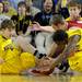 Michigan guard Matt Vogrich, left, and guard Carlton Brundidge, right, scramble for the ball against Indiana guard Jordan Hulls. Angela J. Cesere | AnnArbor.com
