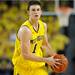 Michigan guard Stu Douglass looks down the court for a pass in the second half. Angela J. Cesere | AnnArbor.com
