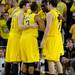 Michigan teammates break for a huddle towards the end of the second half of the game against Indiana. Angela J. Cesere | AnnArbor.com
